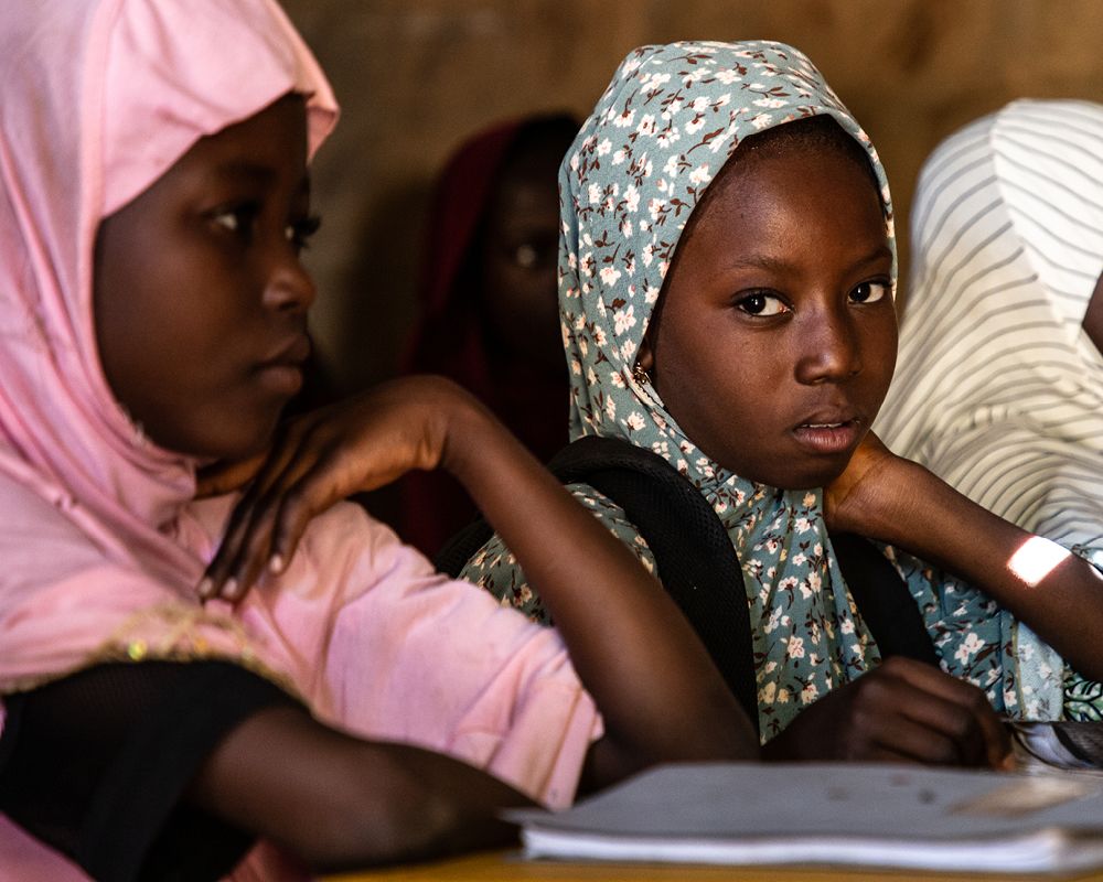 Three girls studying at school 