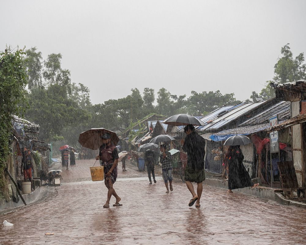 People walking in heavy rain
